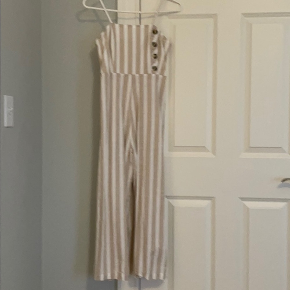 White and tan romper.